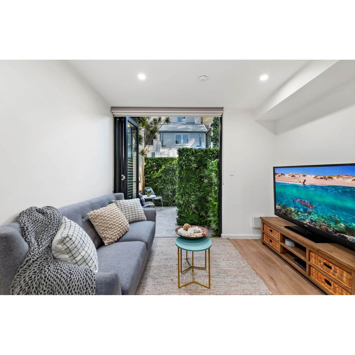Premium Artificial Vertical Garden Panel Vista Green Along a Timber Back Fence View from Kitchen