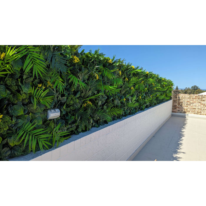 Faux Flowering Artificial Green Wall Panels on a roof top garden miami