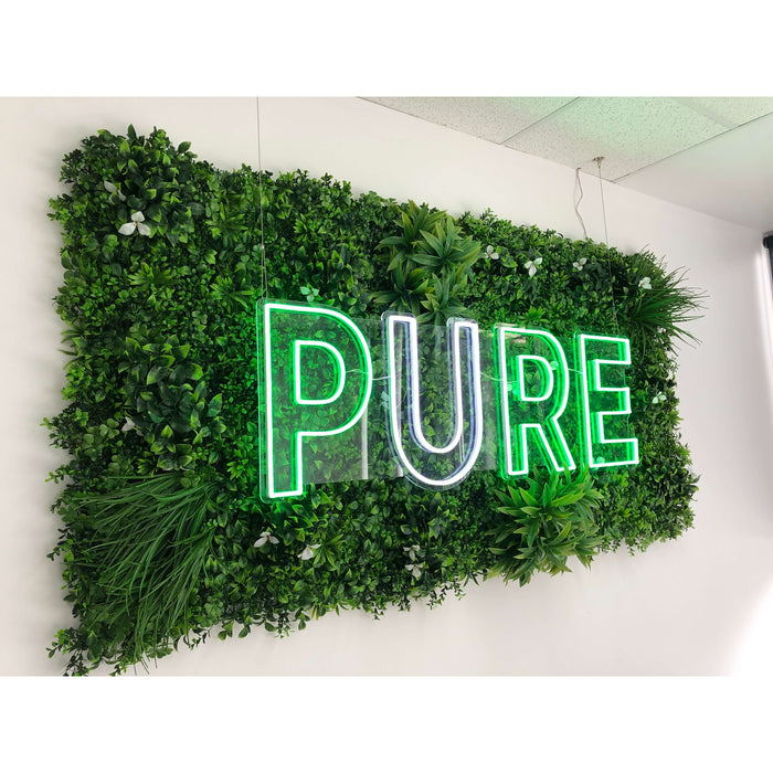 Artificial Green Wall Panel Used for Signage in a Shop