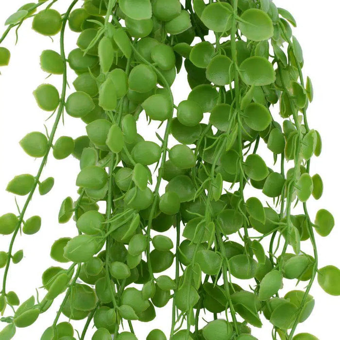 Close-up of dense artificial green foliage.