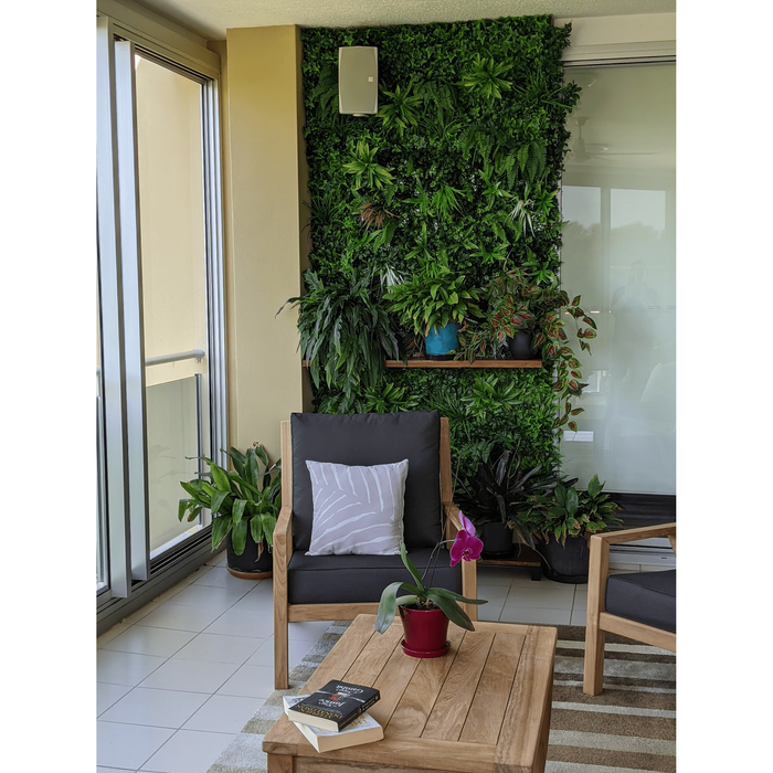 Wall feature with artificial vertical garden panels