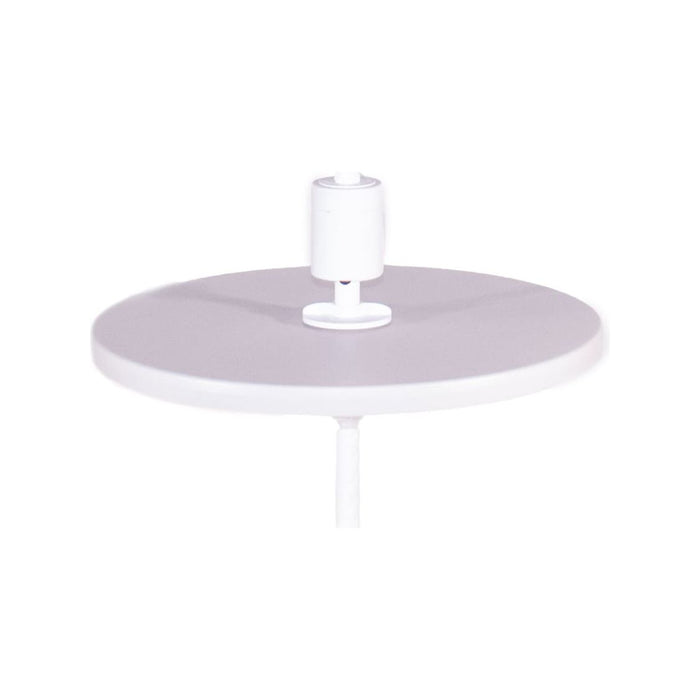 Round white Helux table on a white background