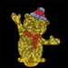 Decorative lighted bear figure with a red scarf and colorful hat on a black background