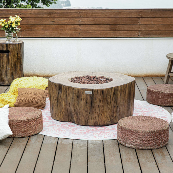 Outdoor setting with a wooden fire pit table and seating on a wooden deck.