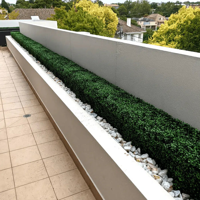 Faux Boxwood Hedge along a balcony