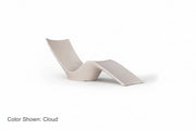 An Autograph Chaise Sunlounger designed for poolside use or in pool use, featuring a curved and ergonomic design. Shown in Ledge Lounger's Cloud color