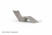 An Autograph Chaise Sunlounger designed for poolside use or in pool use, featuring a curved and ergonomic design. Shown in Ledge Loungers Sandstone color