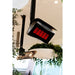 Outdoor Platinum Gas Heater mounted to ceiling on a blurred background with a view of another one from behind in the background