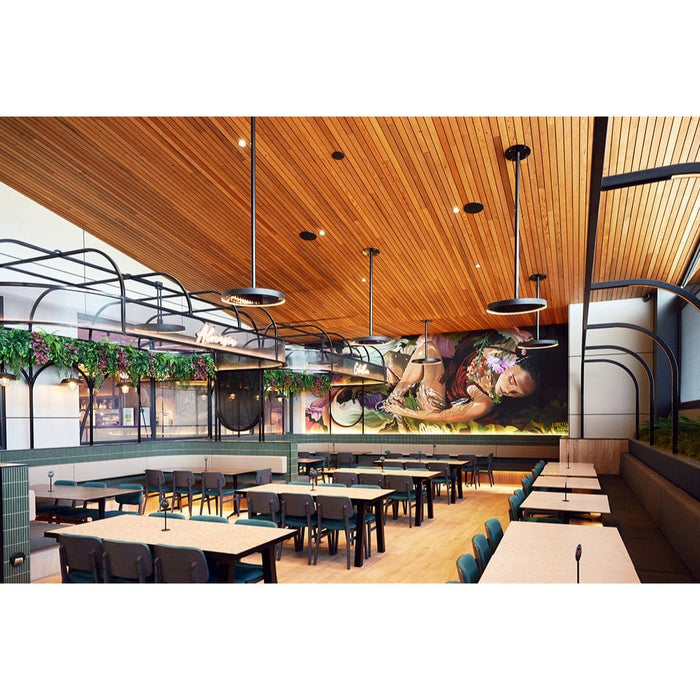 Bromic Eclipse Heaters ceiling mounted Modern restaurant interior with wooden ceiling, tables, and a large mural on the wall