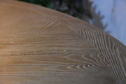 Close-up of a wooden surface of Elementi Lafite with visible grain and texture.