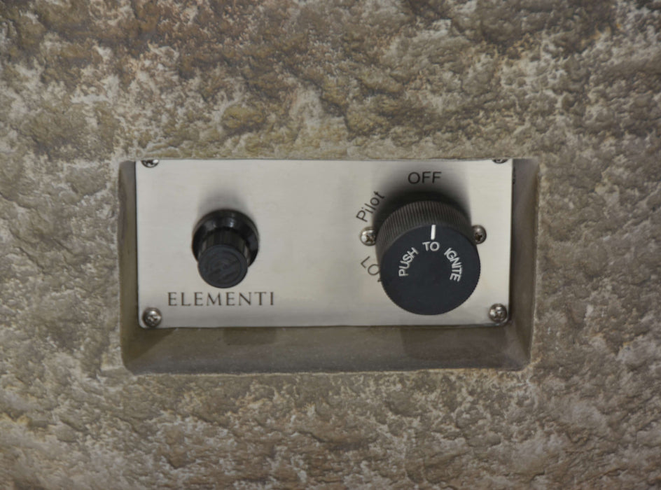 Control panel with two knobs on a textured wall, featuring the brand 'Elementi'.