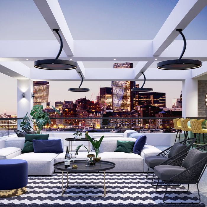 Bromic Eclipse Heaters used in Modern rooftop lounge area with city skyline view