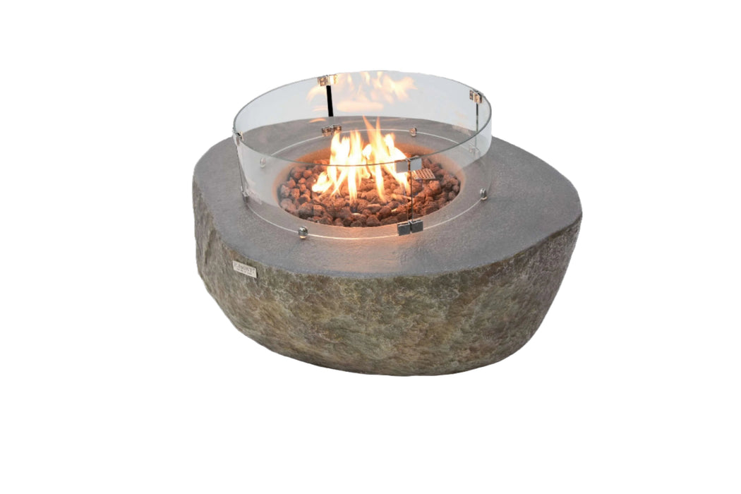 Round stone fire pit with glass cover on a white background