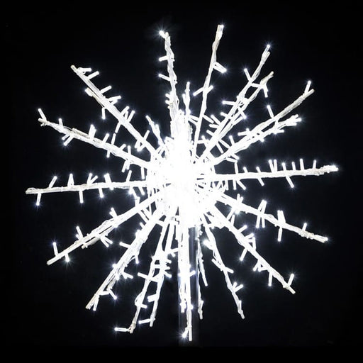 Decorative snowflake light fixture on a black background