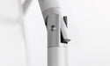 Close up of the tilt system feature of a Ledge Lounger Signature umbrella on a white background