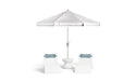 Ledge Lounger outdoor furniture set. Includes: Striped patio umbrella with two matching white Ledge Signature Chaises with headrest pillows on a white background