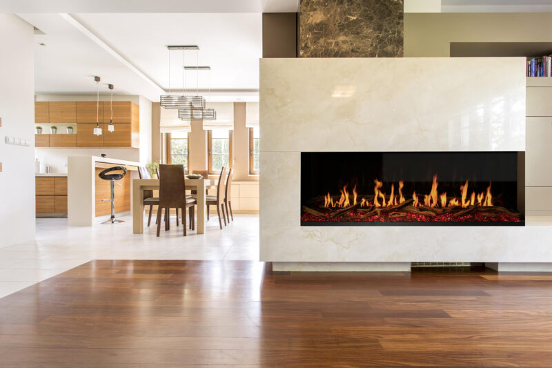 Modern living room with a electric fireplace and wooden floor.