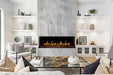 Modern living room with a marble fireplace and white shelves.