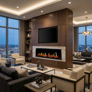 Modern living room with a fireplace, television, and city skyline view.