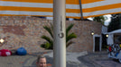 Close-up of a Shadowspec umbrella pole with a blurred background