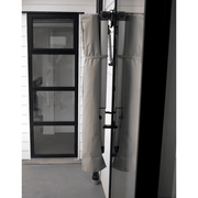 Shadowspec Retreat Wall Mounted Umbrella closed and wrapped in protective cover. 