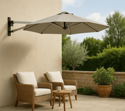 Shadowspec Retreat Wall Mounted Commercial Umbrella above two chairs