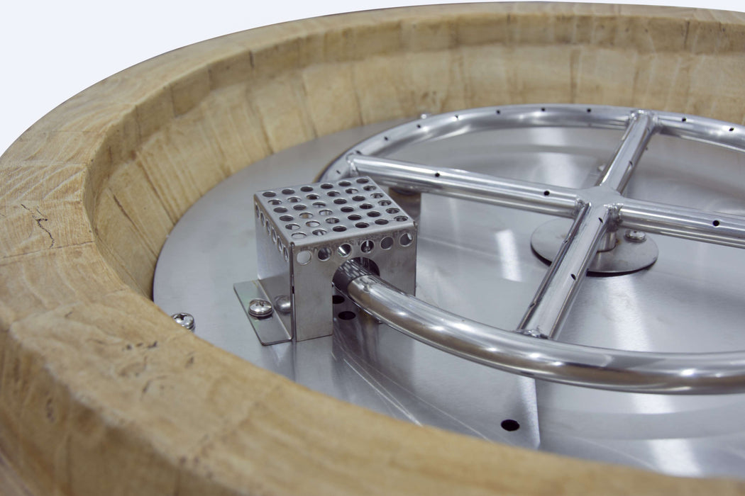 Metallic component inside a wooden barrel on a white background