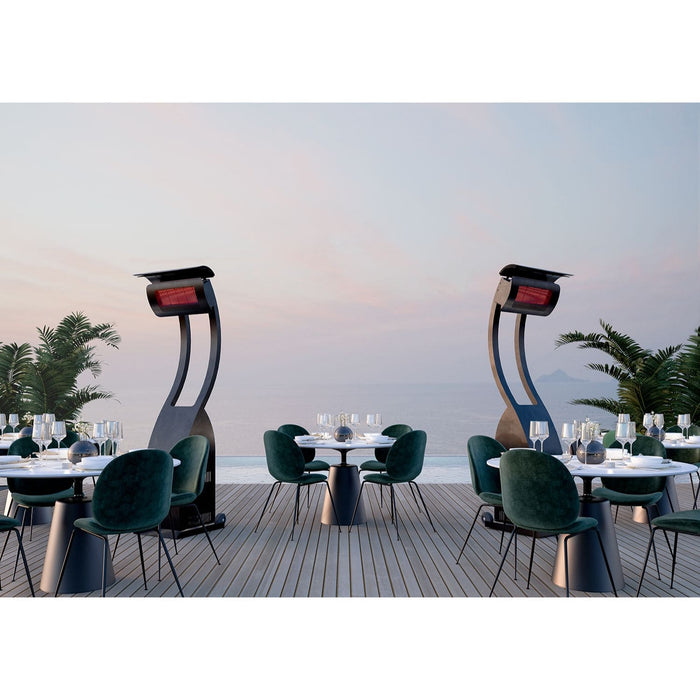 Outdoor dining area with modern chairs and tables on a deck with palm trees and a clear sky. Gas Tungsten Freestanding Patio Heaters pictured in the photo