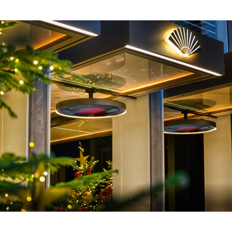 Bromic Eclipse Heaters acting as Modern outdoor lighting fixture with decorative elements at night