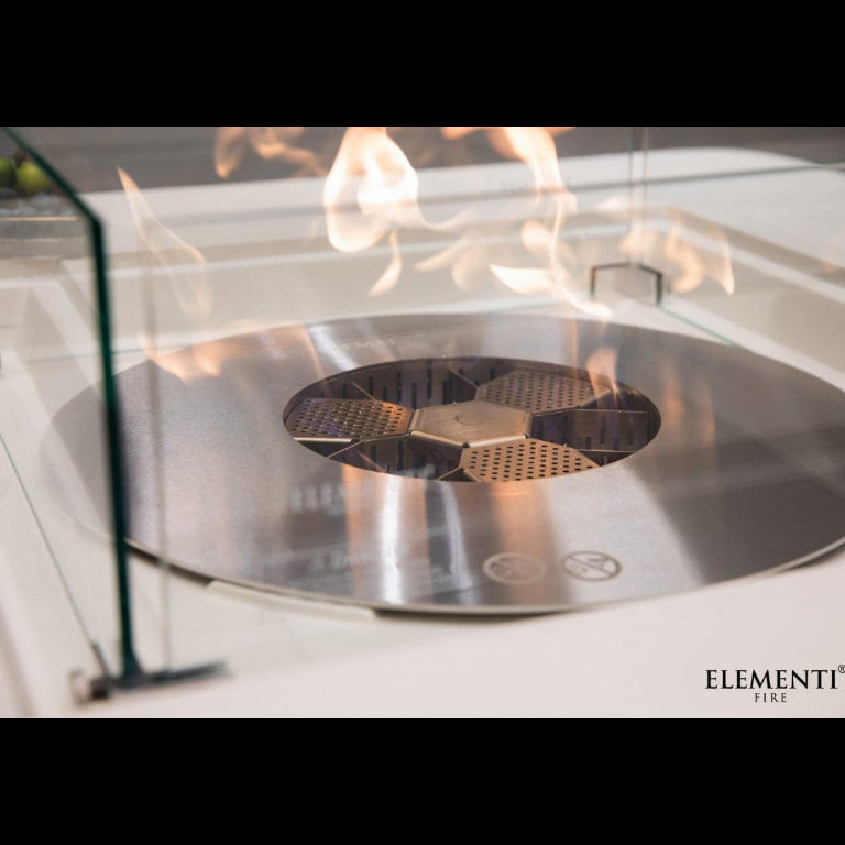 Stainless steel fire pit with flames and 'Elementi' branding.