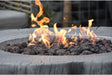 Fire pit with flames burning on a blurred background