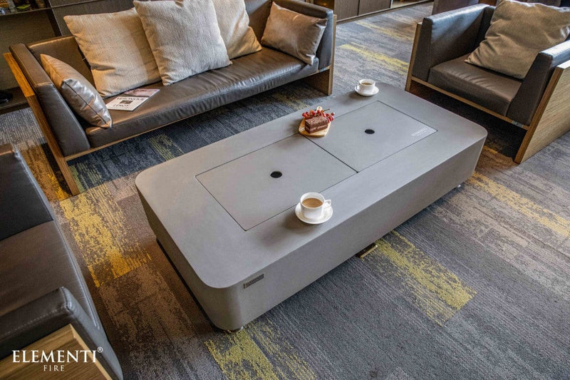 Modern living room with a large gray Elementi Sydney coffee table and matching sofa.