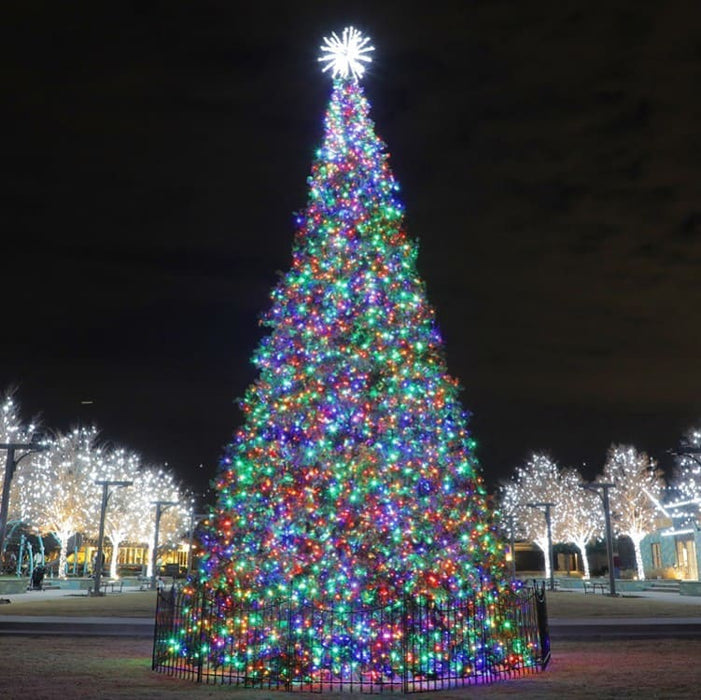 Decorative Christmas tree with colorful lights at night