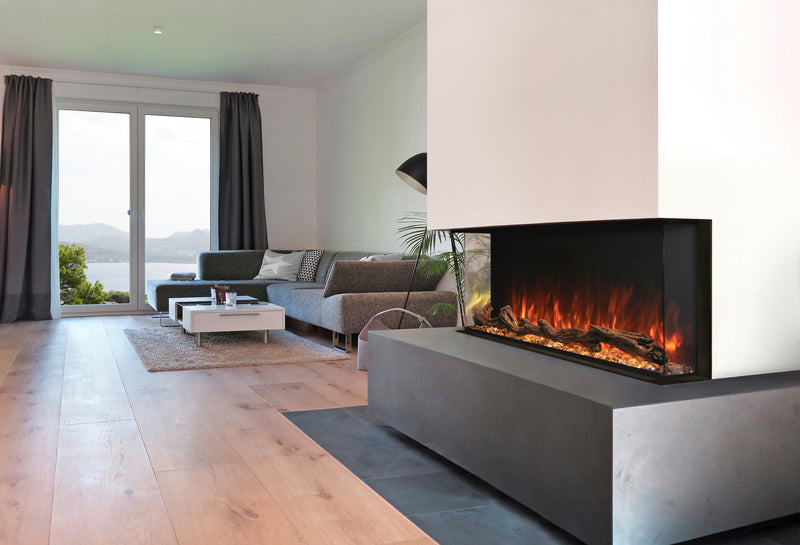 Modern Flames 44 inch Landscape Pro Multi fireplace set into a white wall on a gray concrete base in a living room