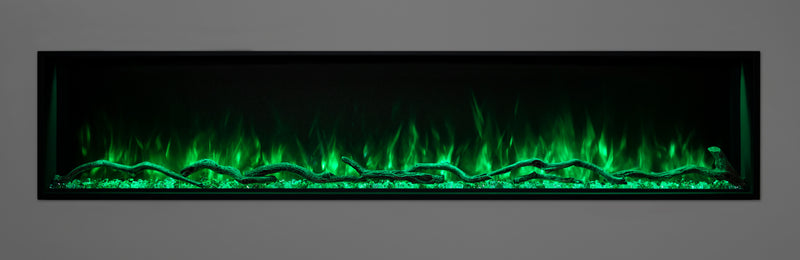 Green flames over driftwood logs in a Modern Flames Landscape Pro Slim fireplace