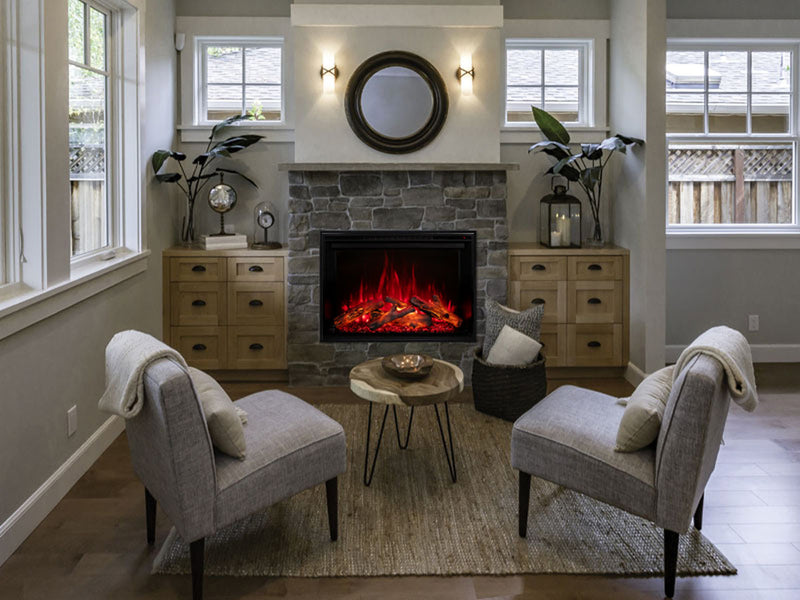 Modern Flames Redstone electric fireplace in a stacked stone surround between two wood cabinets