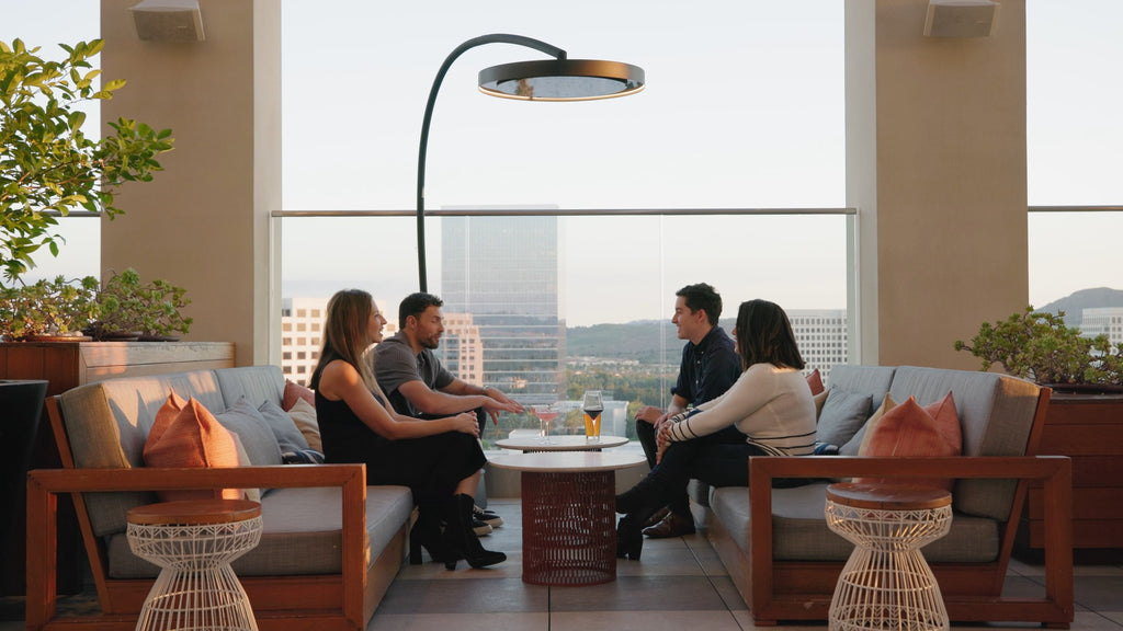 Bromic case study of Eclipse Portable Heaters and Tungsten heaters at a rooftop restaurant called Hive & Honey. Explaining the aesthetic requirements, wind requirements, and practicality requirements of the heat plan for the restaurant and how Bromic met these needs perfectly.